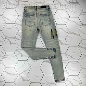 Men's Jeans designer HM591 Slim jeans Distressed White leather pants With Holes Letters Torn Tattered Knee Ripped Skinny Straight Leg Size 28-40 Long 2023 YGYS