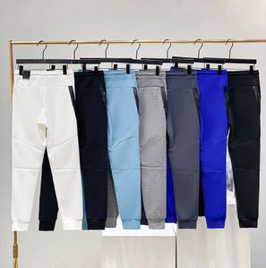2023 Nowe spodnie męskie spodnie jesienne zimowe swobodne sznurki dresowe dresowe technologie mężczyźni kobiety jogger para