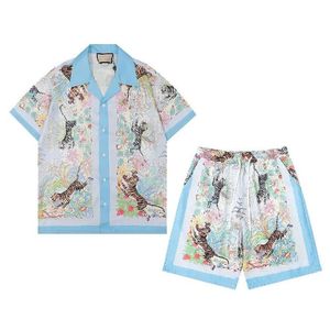 Mens Beach Designer Tute Abiti estivi Moda Donna T-shirt Camicie da vacanza al mare Pantaloncini Set da uomo Luxury Casual Flower Let250F