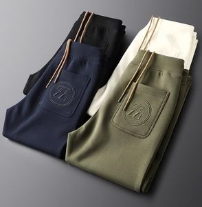 Calça de moletom masculina calça cargo outono inverno manter aquecido Calças dobráveis ​​branco Preto azul exército verde Calças com cordão Jogging stretch calças casuais Tamanho asiático M-5XL