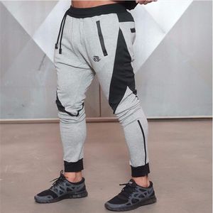 Whole-2016 Neue Goldmedaille Sport Fitness Hosen Stretch Baumwolle männer Fitness Jogging Hosen Hosen Körper Ingenieure Jogger out219S