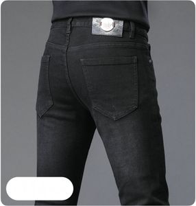 Nowe spodnie dżinsowe spodni męskie spodnie rozciągnij jesień zima ajicon haftowane bliskie dżinsy bawełniane spodnie myte proste biznesowe biznes mk9816-0