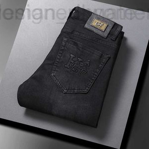 Мужские джинсы Дизайнерский дизайнер Guangzhou Xintang Корейские облегающие брюки Slim Fit Толстые европейские молодежные Чистые черные осенне-зимние модные бренды ZZVE 8HFN