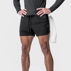 Koşu şort erkekler hızlı kuru egzersiz vücut geliştirme spor salonu spandex cep futbol futbolu eğitimi tenis jogging