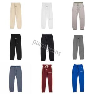 Kısa Erkek Tasarımcı Pantolon ESS Giyim Pantoufle Düz Renk Siyah ve Beyaz Sweatpants Erkekler Kadın Jogger Essen Hoodie Set