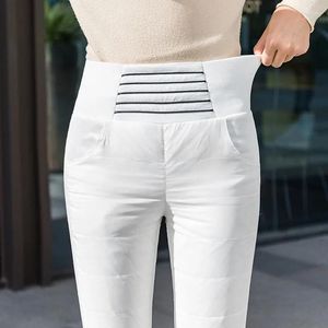 Calças femininas 2023 inverno quente pato para baixo moda coreana listrado branco engrossar calças mulheres magro cintura alta algodão estiramento lápis