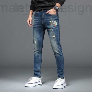 Jeans firmati da uomo Jeans ricamati, marchio trendy da uomo, blu lavato, usurati, vestibilità slim, forati, piedi piccoli, pantaloni lunghi autunnali e invernali S2CO TEL9