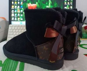 Hot sell AUS classical Design L Bow U boots women snow bowknot keep warm Genuine Leather Sheepskin plush Free transshipment U203