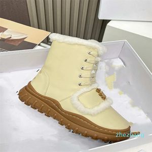 2023-Designer de luxo projeta botas de neve populares com parte superior de couro de vaca resistente ao frio para boa retenção de calor e antiderrapante