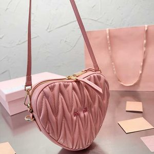 Pink Heart Bag Women Leather Elegant Handbags Mini Designer väskor Girls Söt axel Crossbody Bag Fashion Chain Phone Purse 231011