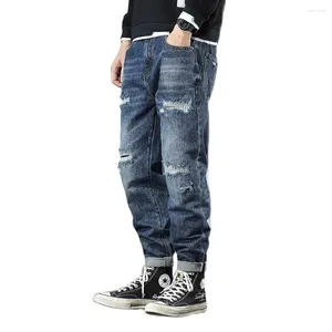 Jeans da uomo Pantaloni retrò strappati da uomo Casual Pantaloni larghi in denim effetto consumato Streetwear Pantaloni Harem Abbigliamento di tendenza