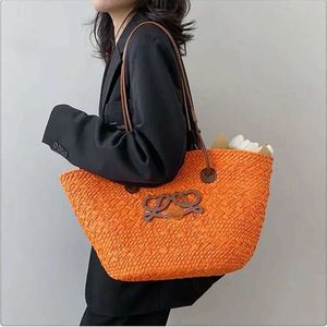 Handväska 30% rabatt designer väska ny mode strand loewees kvinnors axel personlighet halm kvinnors tygväska