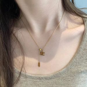 Collana Arco di Trionfo pendente con coulisse Collana in acciaio al titanio placcato oro con catena alla clavicola da donna