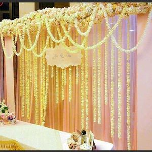 Dekorative Blumen, elegante weiße künstliche Orchidee, Wisteria-Rankenblume, 2 Meter lange Seidenkränze für Hochzeits-Hintergrunddekorationsaufnahmen