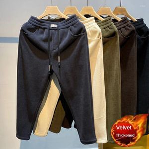 Pantaloni da uomo in pile spesso termico esterno invernale caldo pantaloni casual pantaloni da jogging comodi pantaloni sportivi con piedi legati a prova di freddo