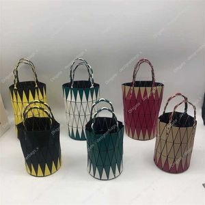 Handväska japansk Lingge Original Factory Bag Style Vegetabilisk korg Kvinnor hinkväskor skarvad kontrastfärg frostad vikning