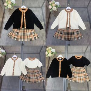 sukienka dziewczyny czarny kolor designerski dziecięcy moda odziowa zestaw zimowy sweter i spódnica w stylu Anglii sukienki dla dzieci