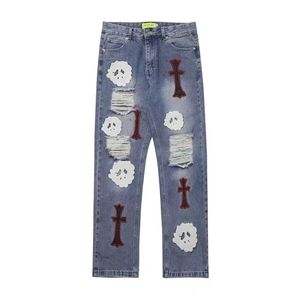 Mens Jeans European Jean Hombre Letter Star Men broderi lapptäcke rippade för trendmärke Motorcykelbyxa Minnes Skinny 24s