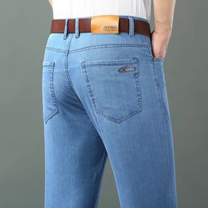 Jeans da uomo Primavera Estate Jeans sottili in cotone dritto elasticizzato da uomo Business Casual Panno Vita alta Pantaloni leggeri in seta di ghiaccio 231012