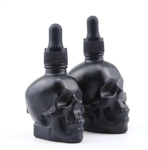 60 ml glasflaskdroppe 2oz svart klar skalle huvudform flytande parfym väsentliga grundläggande massage oljepipett påfyllningsbara flaskor