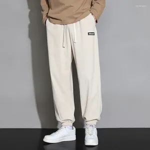 Pantaloni da uomo Casual in velluto a coste Primavera e autunno Sport Pantaloni sportivi larghi a vita alta a tutta lunghezza Tinta unita Uomo coreano Quotidiano