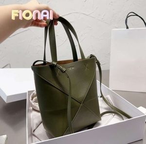 Cowhide Handbag Puzzle Fold Tote Bag Designer Crossbody Bag Luxury Shoulder Bags Women Crossbody Bag Glitter Rem Bag Nya nya shoppingväskor Lows Loewees GG2