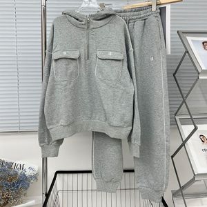 Calças femininas de duas peças designer de luxo outono e inverno estilo academia americana duplo bolso contraste crimpagem esportes casuais conjunto versátil para mulheres