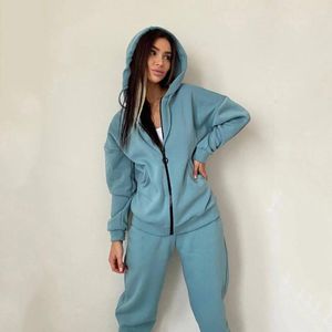 Tracksuits masculinos 2023 outono outfits mulheres zíper com capuz jaqueta calças terno outono inverno solto e confortável esportes conjuntos de duas peças