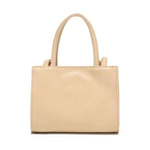 Designer Tote Women Small New Fashion Solid Simple Multi Color Shoulder Hand Väsentlig för shoppingväskan 17CMX12CMX8CM