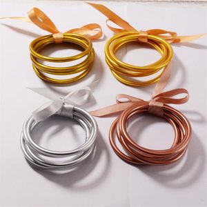 Glänsande guld buddhiststrängar rusar armband fina bharm buddha flickor armband silikon plast glitter gelé ljus gåvor301p