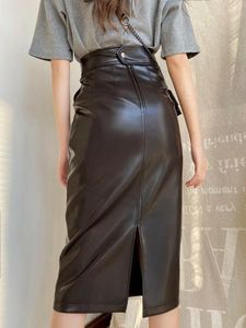Kjolar 2023 Autumn High midja sväng halv längd läder kjol kvinnor kryddig tjej stil klänning svart