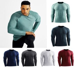 2021 mens T-shirt yoga Europe US running fitness clothing quick-drying tee sportswear long-sleeved compression training stretch Slim tights tops1459832