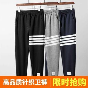 Spring and Autumn Pants Men's Four Bars Terry Cotton Couples Relaxed Sports Loose Streets Knitted Guards Leggings Trend