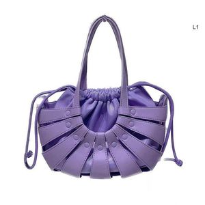 Leather Women's Bag with Half Round Hollow Drawstring 2023 New Hollow Shell and South Korea Shoulder Fashion Net Red Basket