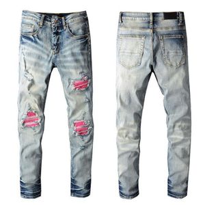 22SS Designer Uomo Jeans strappati Patch rossa Stile vintage Foro Moda Fori Jean Slim Motociclista Causale Uomo Pantaloni Hip Hop Siz239t