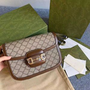 1955 bolsa de sela de couro genuíno feminino clássico flor cavalo título fivela ombro único crossbody bolsas versáteis black friday