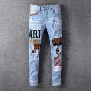 Jeans da uomo Moda Patch Strappato Blu Uomo Slim Fit Designer Pantaloni in denim lavato Pantaloni Hip Hop DJ Party Punk Rock316n