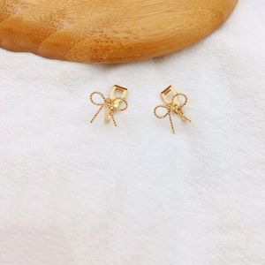 Orecchini con retro finti piercing color oro con fiocco a clip su graziosi piccoli orecchini geometrici con polsini dell'orecchio non forati Gioielli in metallo da donna