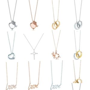 Hänge halsband charm gåva 100% 925 Sier Love and Key Cross Pendant Necklace Rose Gold White Jewelry Match World Fit Jewelry3917441 Dhoyx