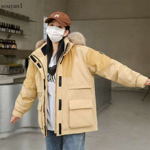 Down Jacket Women's 2023 New Mid Length Couple's Wok Outfit with Thickened Splicing to Ovecome the Tend of Winte Vesatile