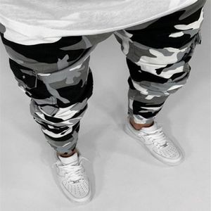 Jeans da uomo Pantaloni cargo mimetici da uomo Pantaloni multitasche in cotone militare Camo Denim Pantaloni militari da pista Streetwear Jeans a matita Ma237c