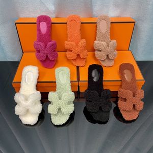 Sandali firmati di marca arancione Pantofole di lana da donna Pantofole piatte in pelle di pecora Sandali soffici e caldi Comode infradito autunnali e invernali