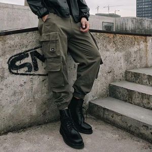 Pantaloni da uomo Salopette con coulisse Moda autunno e inverno Vita multitasche Street Retro Casual Nove minuti