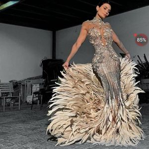 فستان سهرة يوسف aljasmi kim kardashian حورية البحر عالية الرقبة ريشة الفضة حبات طويلة لباس zuhair murad ziaadnakad 0011255x