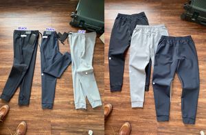 LU-1509 Мужские штаны для йоги Дизайнерская модная одежда Осень-зима Повседневные мужские спортивные брюки на шнурке Бегуны Спортивные штаны Уличная одежда