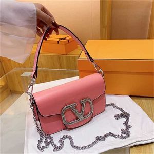 Tomada barata 90% de desconto Bolsa de axilas para mulheres 2023 nova corrente de diamante inset crossbody pequeno quadrado viajando estilo estrangeiro coreano sentimento high-end 5548