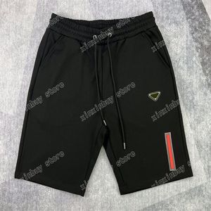 22SS Herrkvinnor Designer Shorts Pants Metal Triangle Label Spring Summer Men Webbing Pant Casual Letter Trousers Black White Xinxi2837