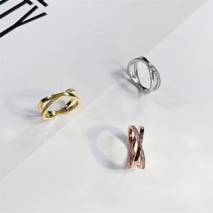 여성 반지를위한 디자이너 반지 X 모양 다이아몬드가 중공 골드 실버 장미 남성 고급 보석 티타늄 스틸 골드 플랜트 F255G