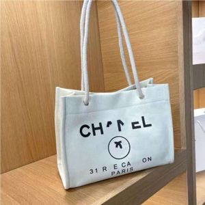 Moda de luxo feminina bolsa marca CH sacos de noite senhoras carta CC tote praia saco grande capacidade casual feminino mochila grande lona portátil bolsas de compras NWTF