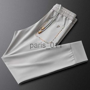 Męskie spodnie wysoka wersja Mężczyzn Casual Tb War Hone Hafted Moders Designer Pant Business Suits Spodnie luźne spodnie dresowe 4xl 5xl x1017
